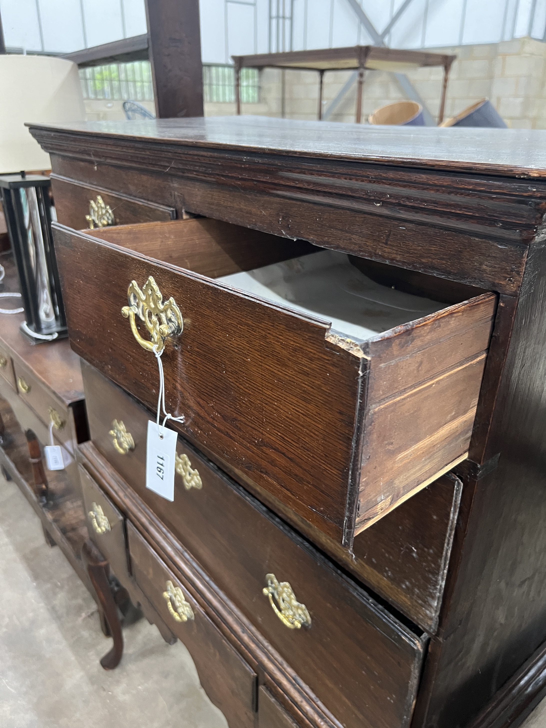 A George III oak chest on stand, width 106cm, depth 58cm, height 144cm